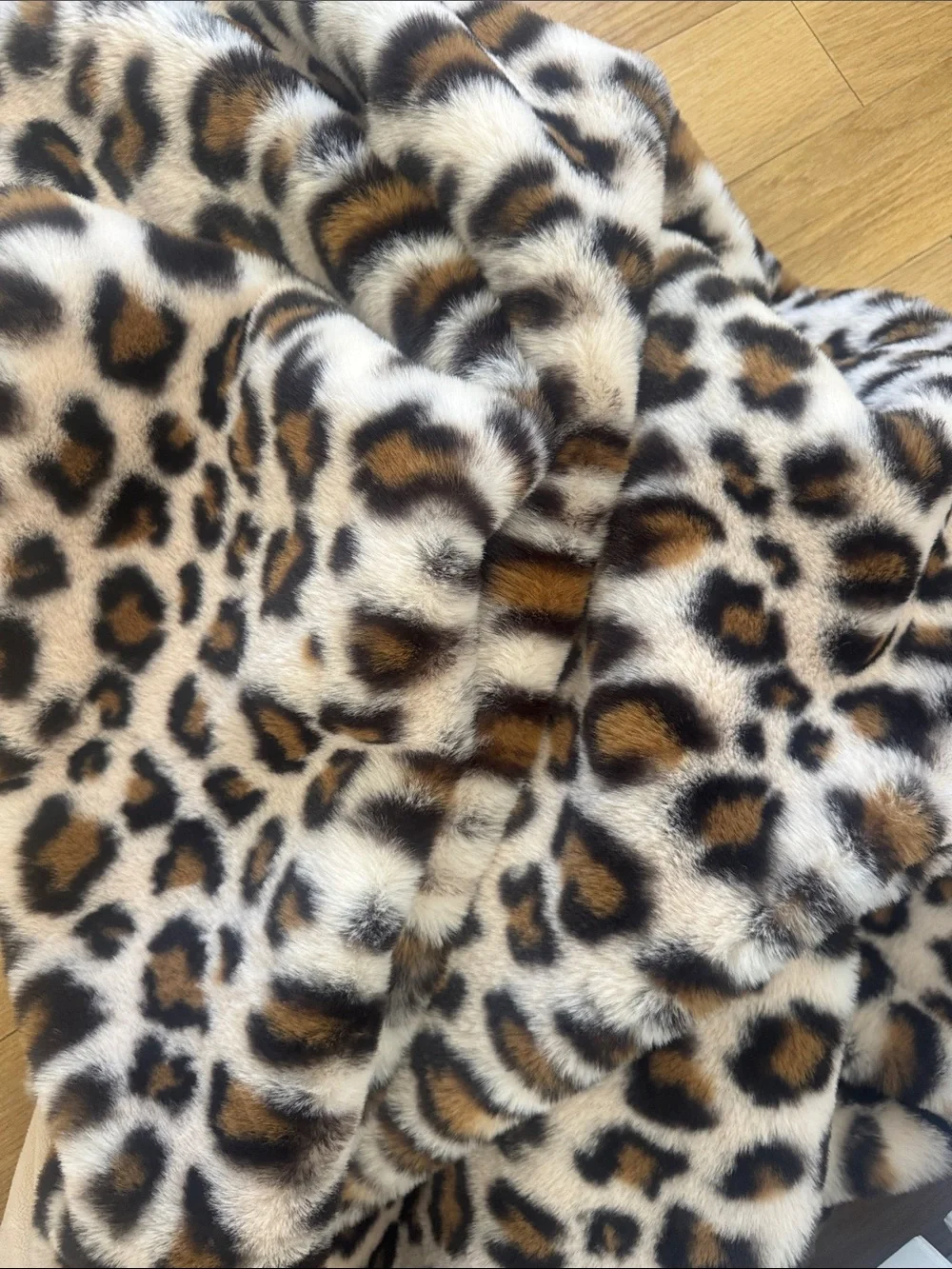 Anthropologie Chester faux fur leopard print throw blanket.